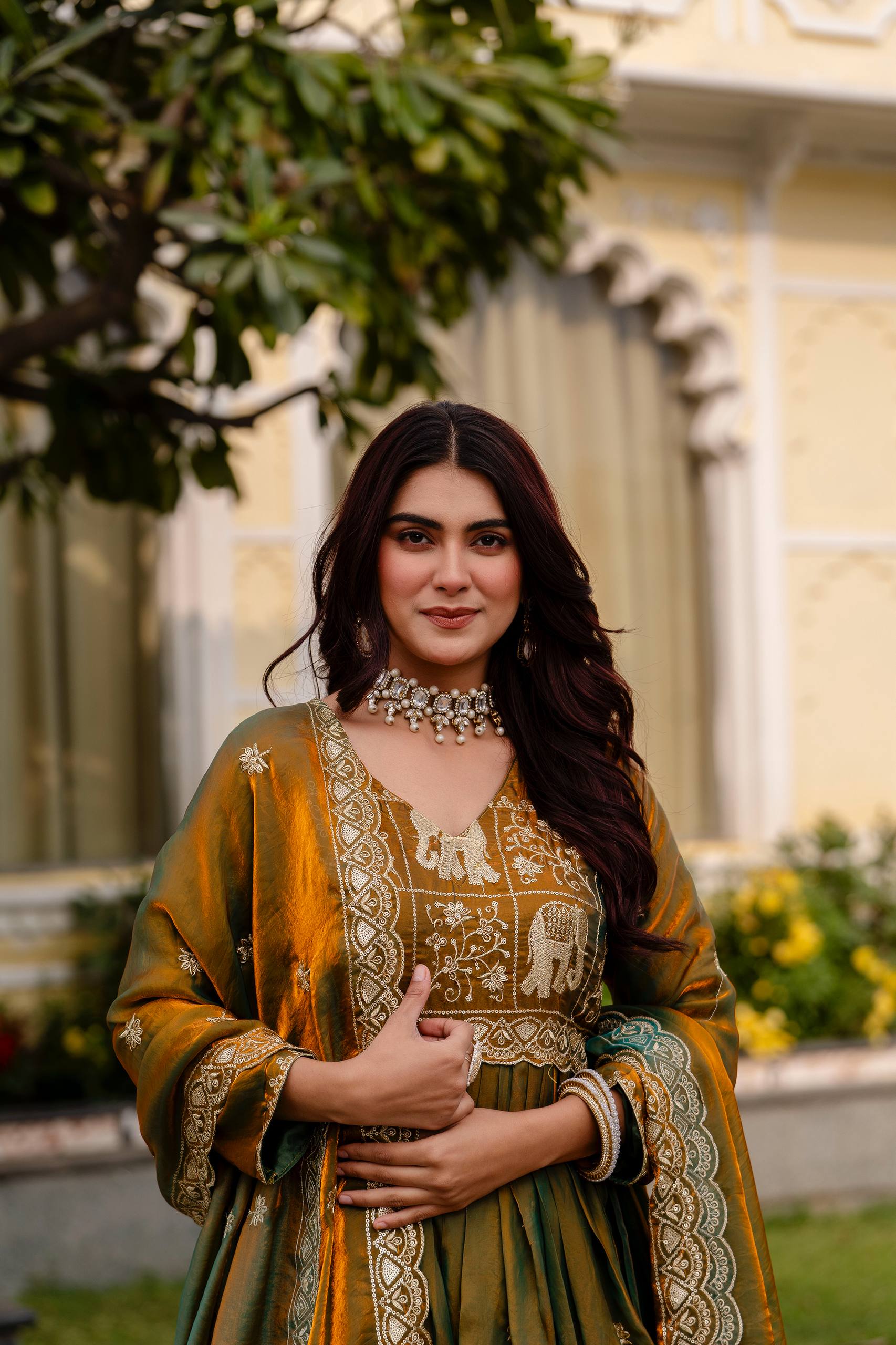 Krishnaveni olive green fendy satin embroidered gown with dupatta