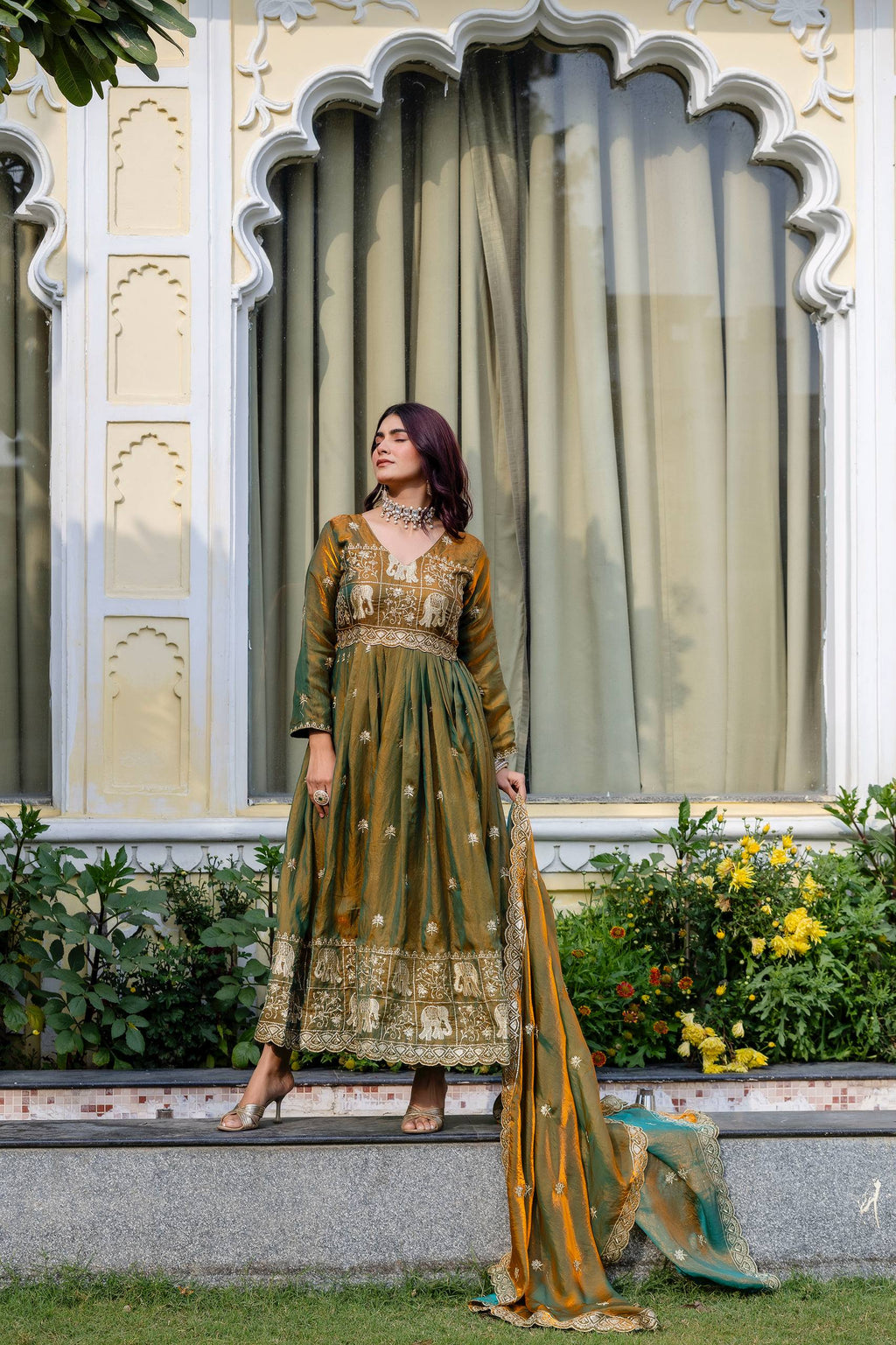 Krishnaveni olive green fendy satin embroidered gown with dupatta
