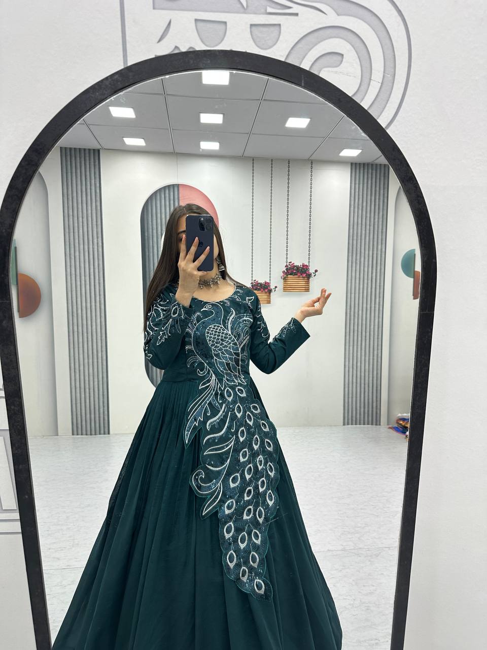 Meenakshi teal green vichitra silk embroidered peacock designed gown