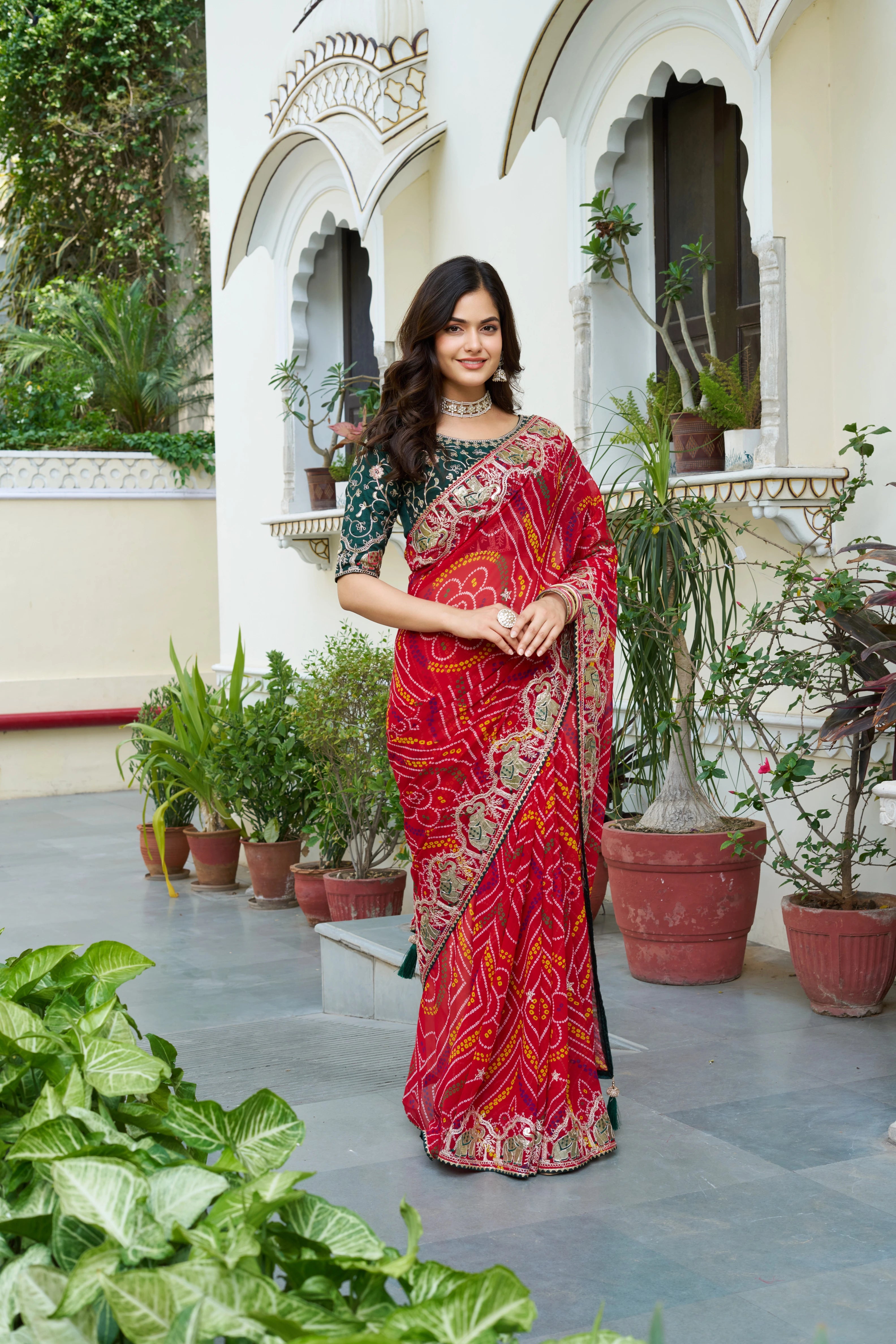 Mrinalini red gota patti work pure bandhani saree