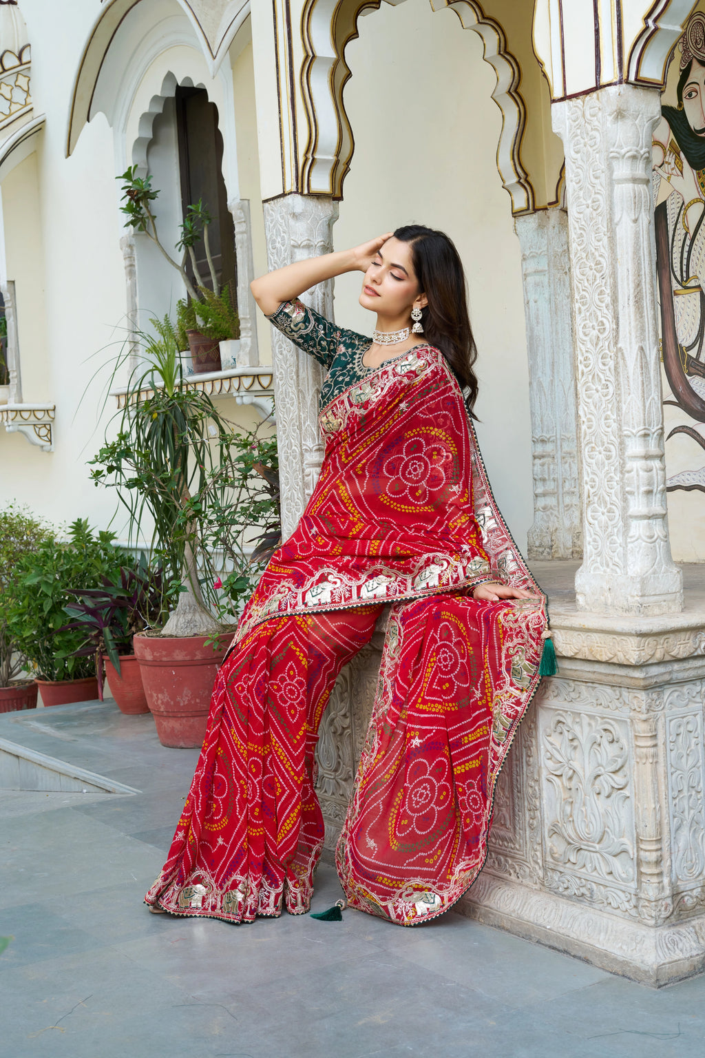 Mrinalini red gota patti work pure bandhani saree