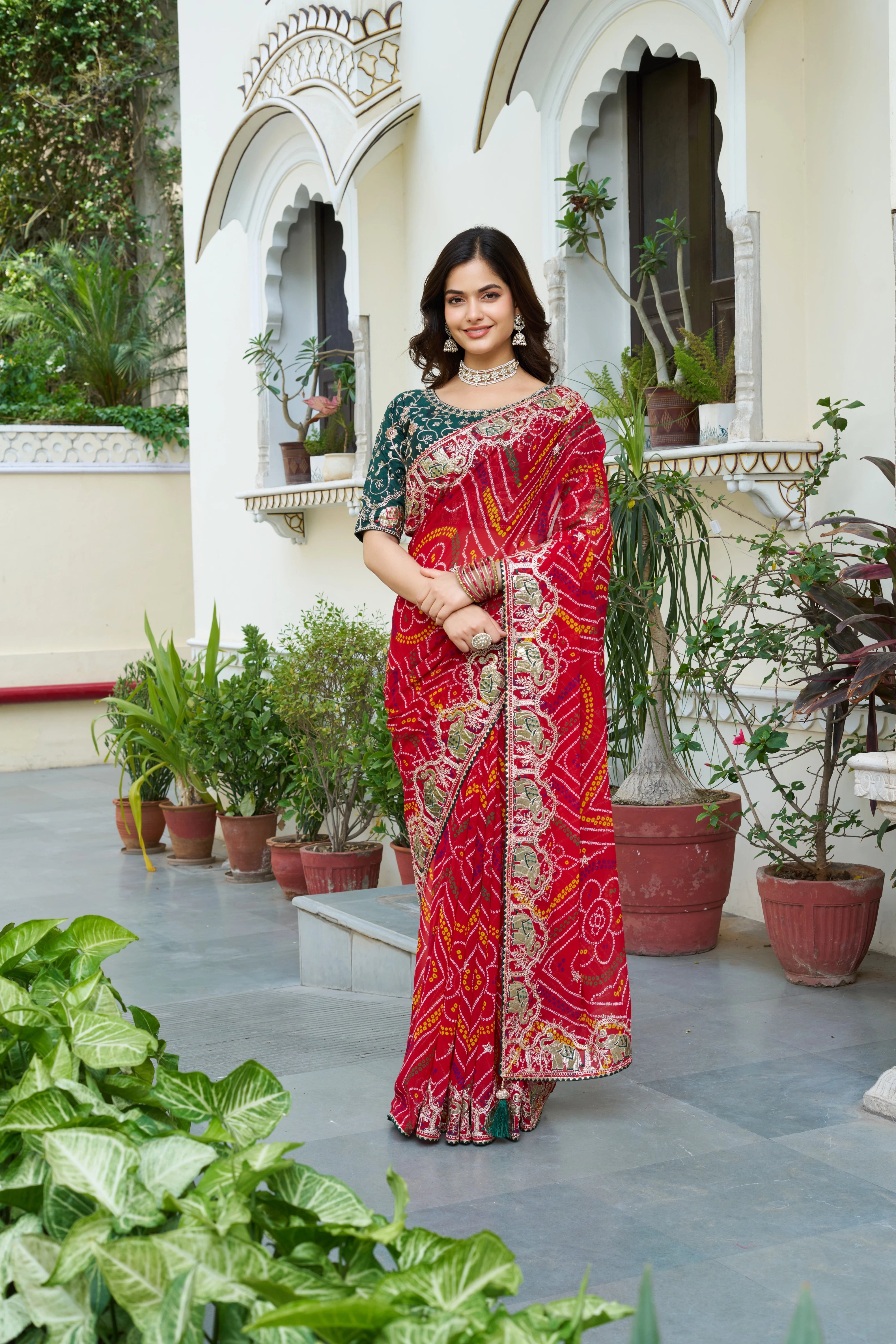 Mrinalini red gota patti work pure bandhani saree