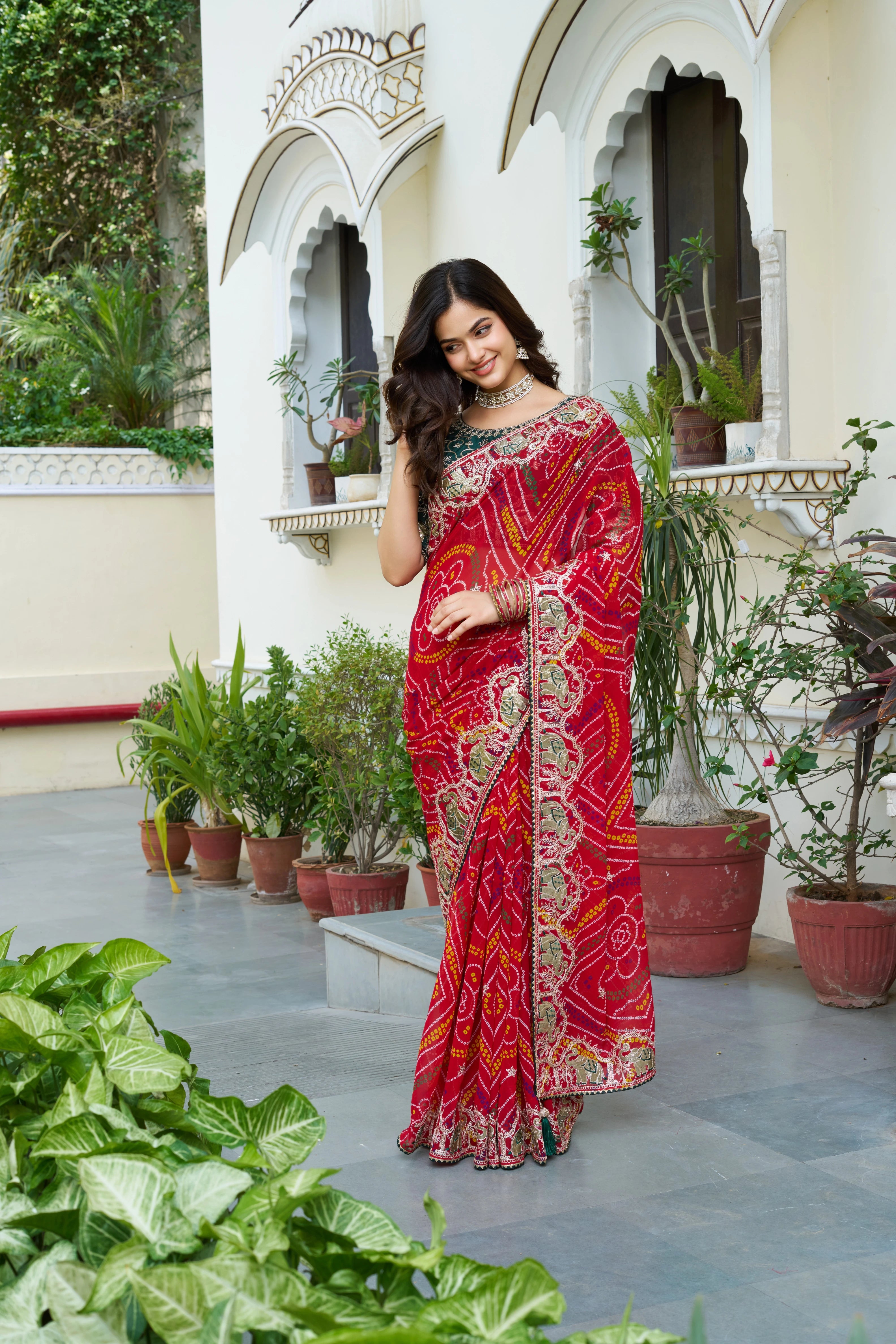 Mrinalini red gota patti work pure bandhani saree