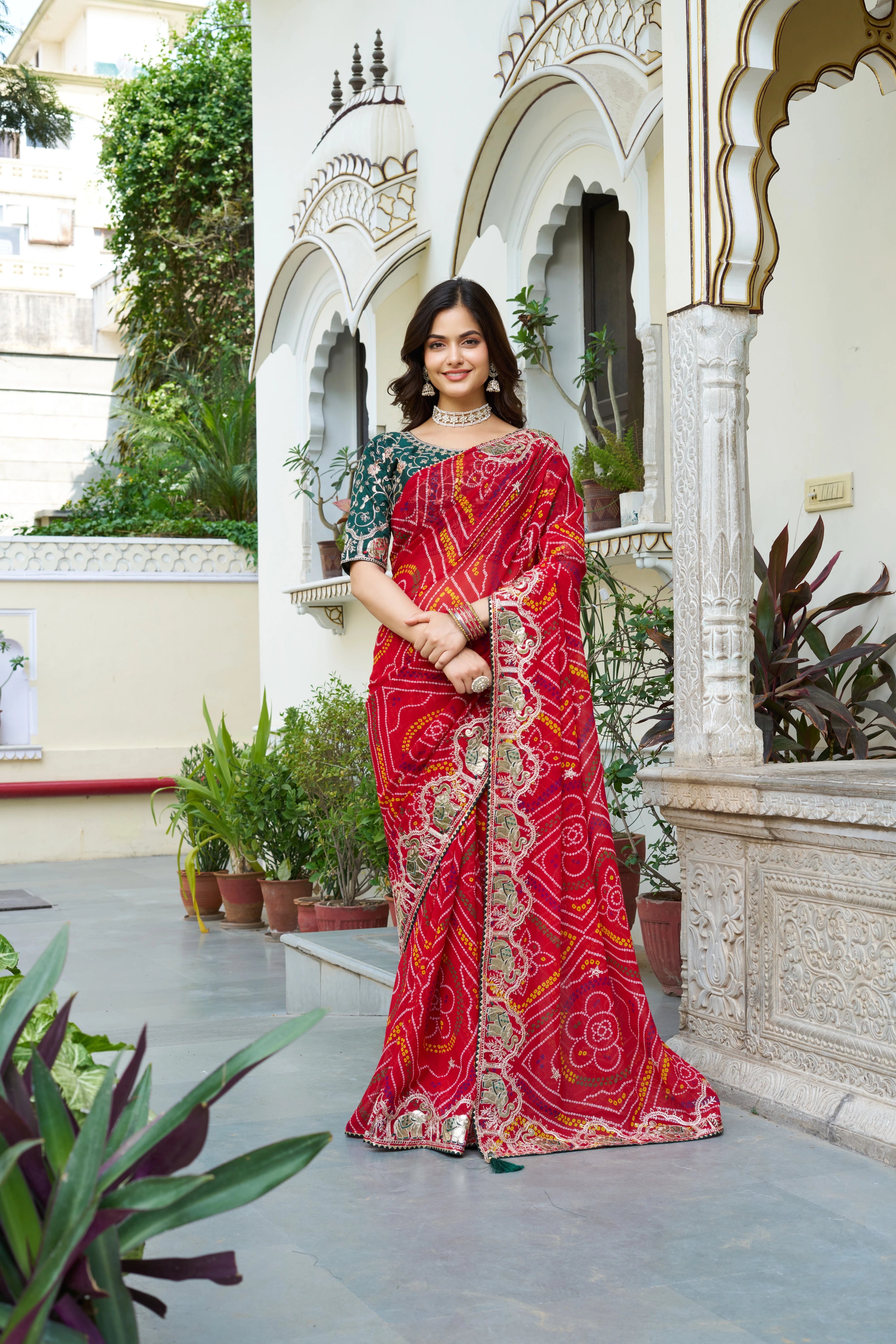 Mrinalini red gota patti work pure bandhani saree