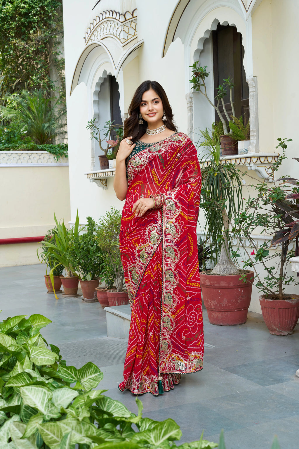 Mrinalini red gota patti work pure bandhani saree