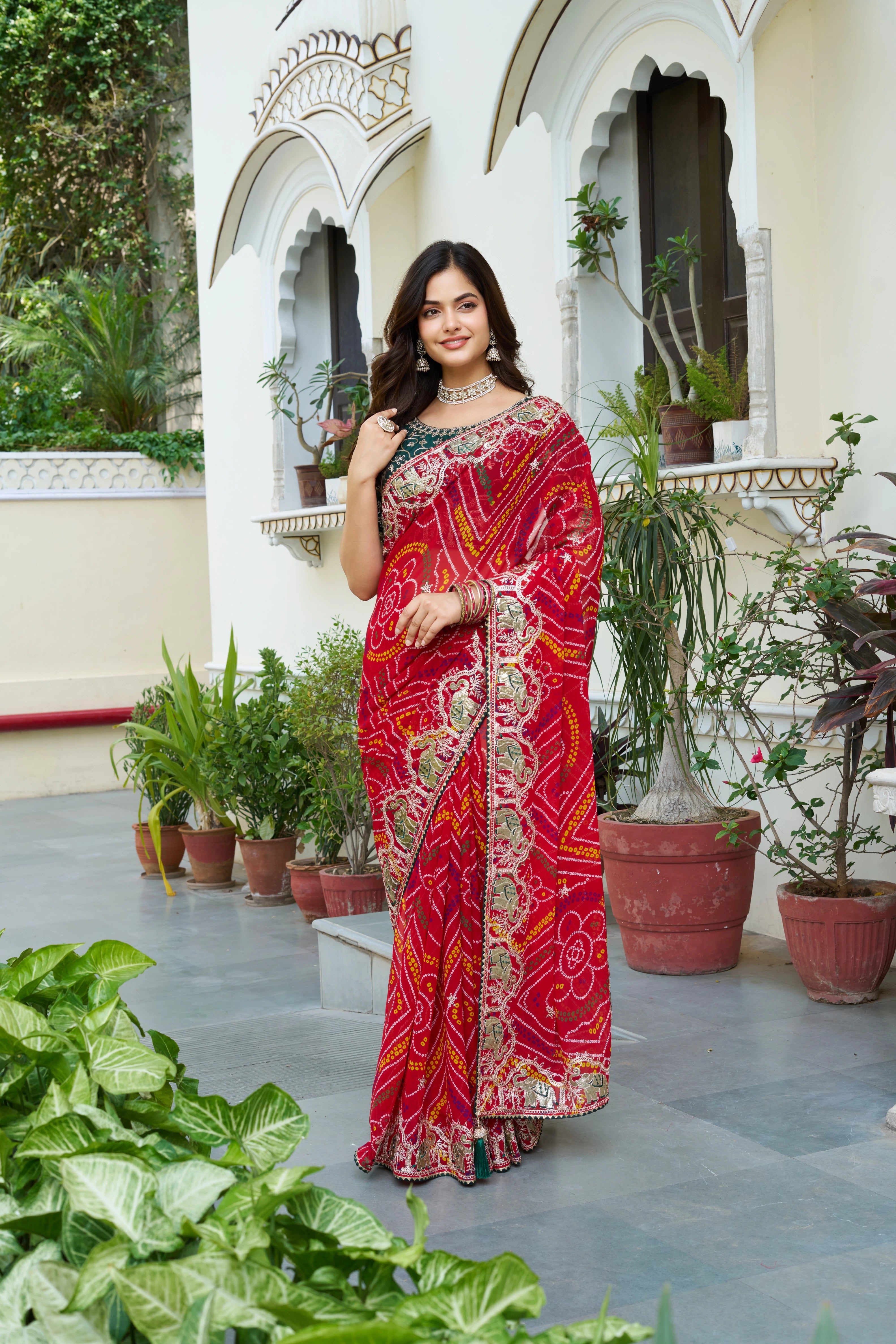 Mrinalini red gota patti work pure bandhani saree