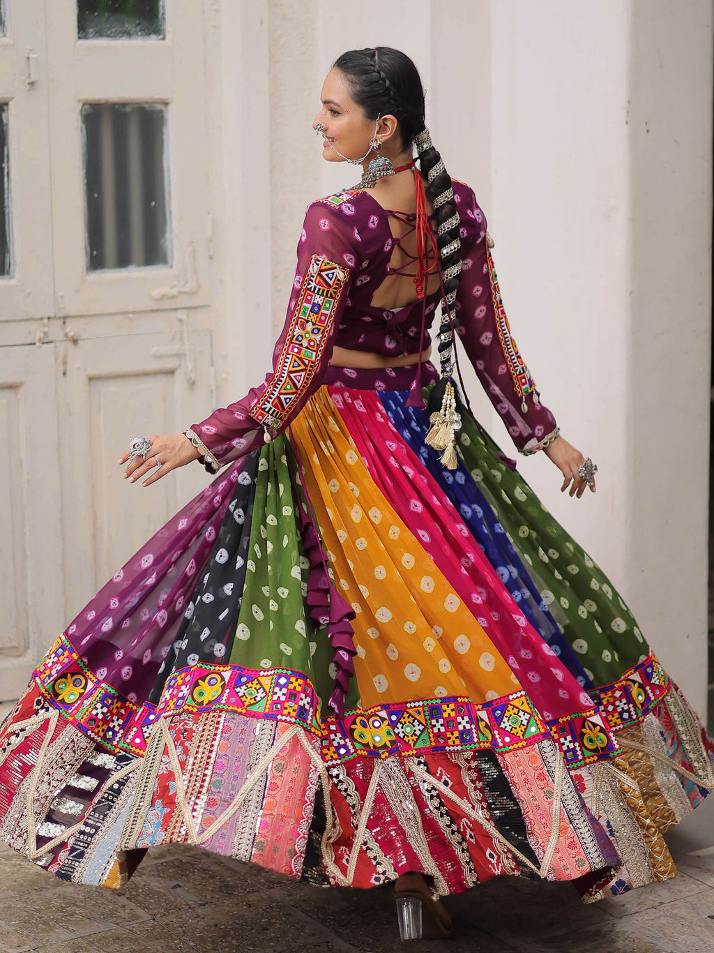 Multicolor georgette Bandhani print and Gamthi embellished work lehenga choli