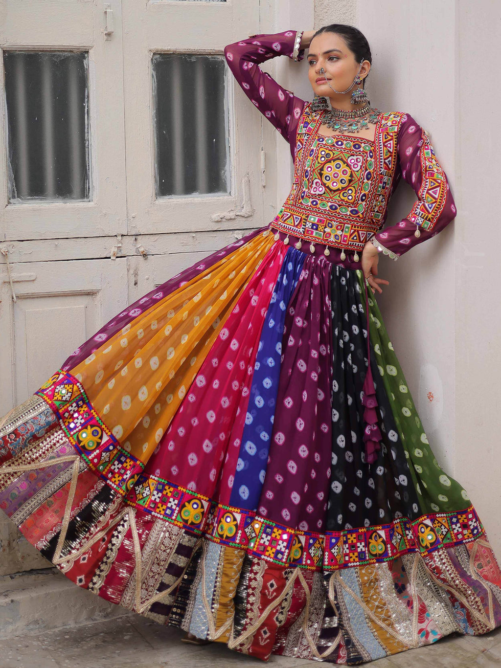 Multicolor georgette Bandhani print and Gamthi embellished work lehenga choli