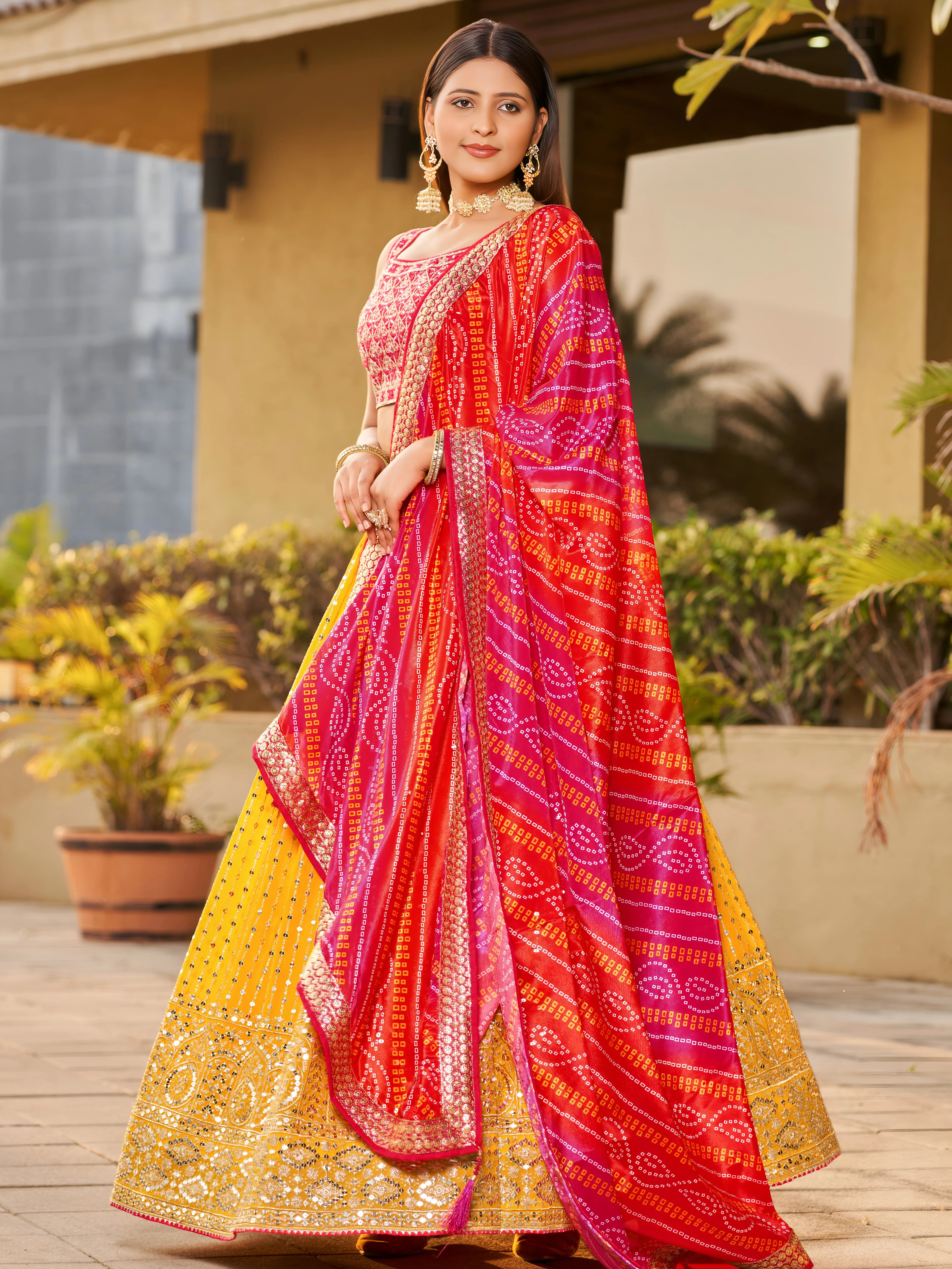 Navya Mustard Yellow Color Embroidered Lehenga Choli with Bandhani Dupatta