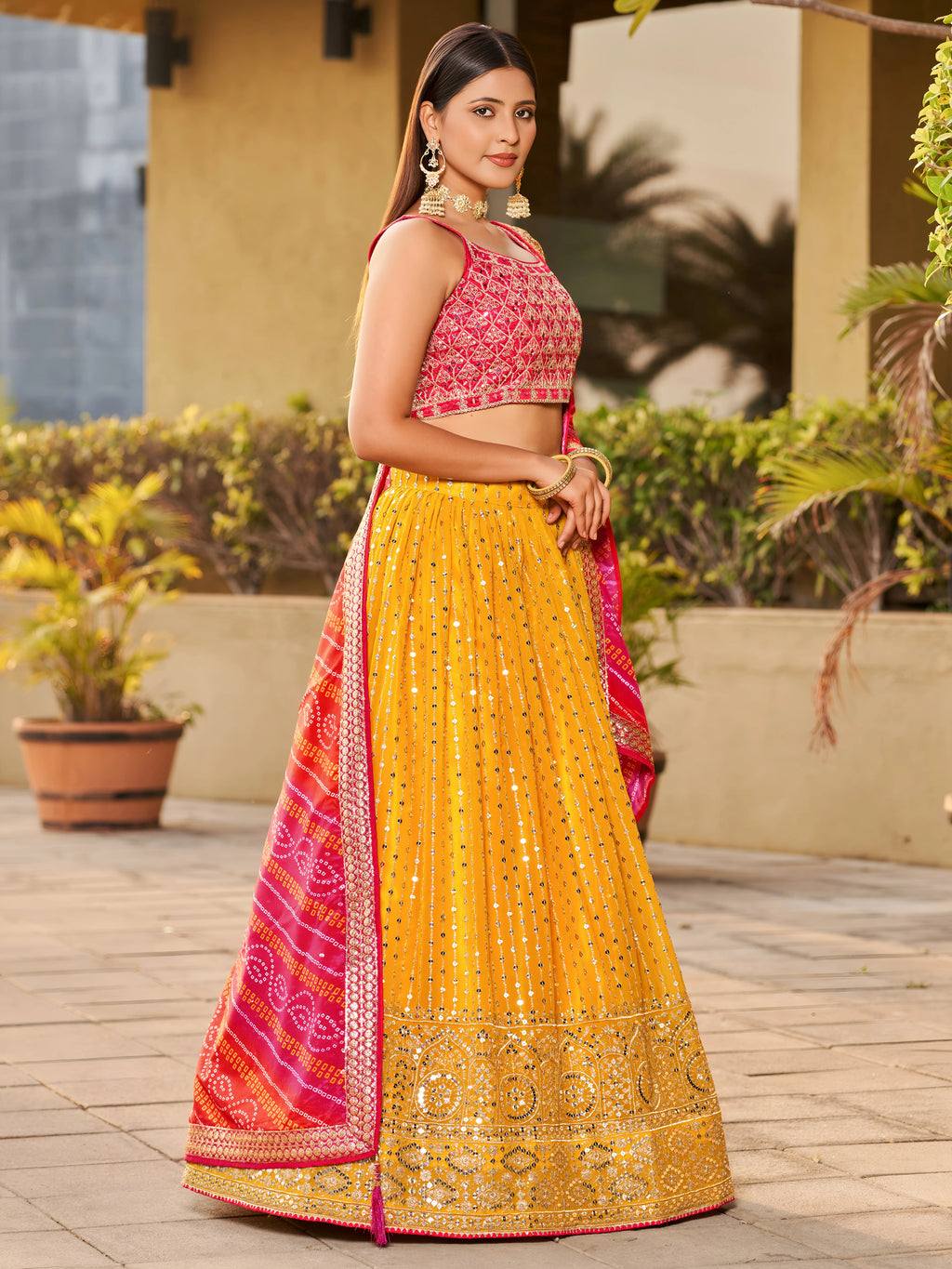 Navya Mustard Yellow Color Embroidered Lehenga Choli with Bandhani Dupatta