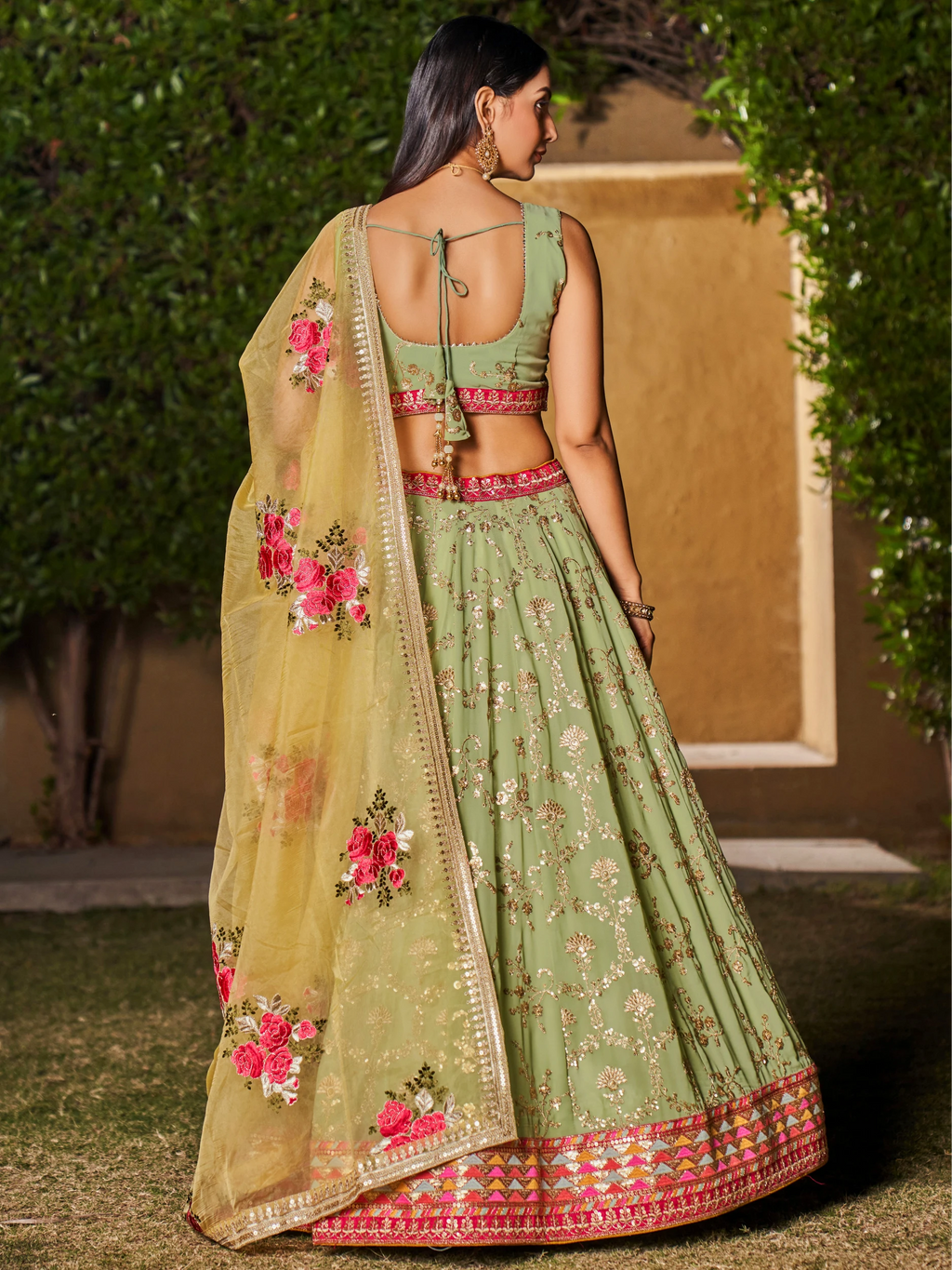 Navya Pista Green Color Embroidered Lehenga Choli with Floral Dupatta