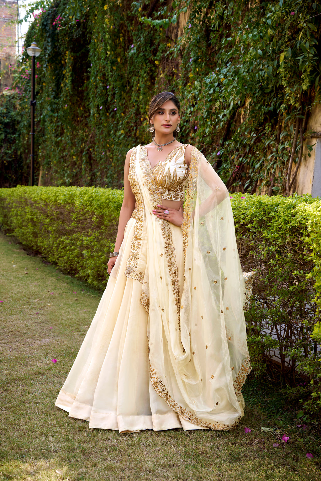 Nayana off-white Chanda silk lehenga choli with sequins thread embroidery work