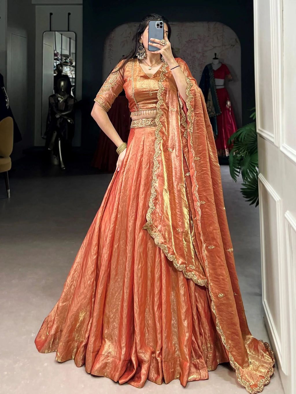 Orange fendi embroidered lehenga choli with sequins thread work dupatta