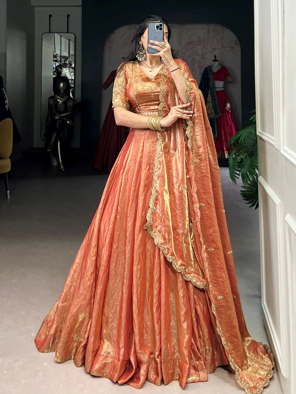 Orange fendi embroidered lehenga choli with sequins thread work dupatta