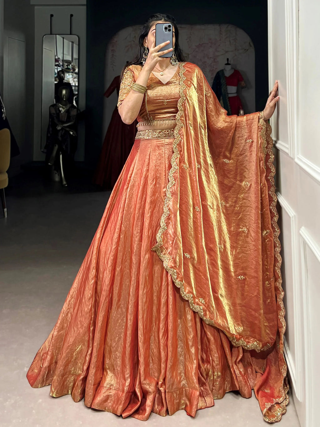 Orange fendi embroidered lehenga choli with sequins thread work dupatta