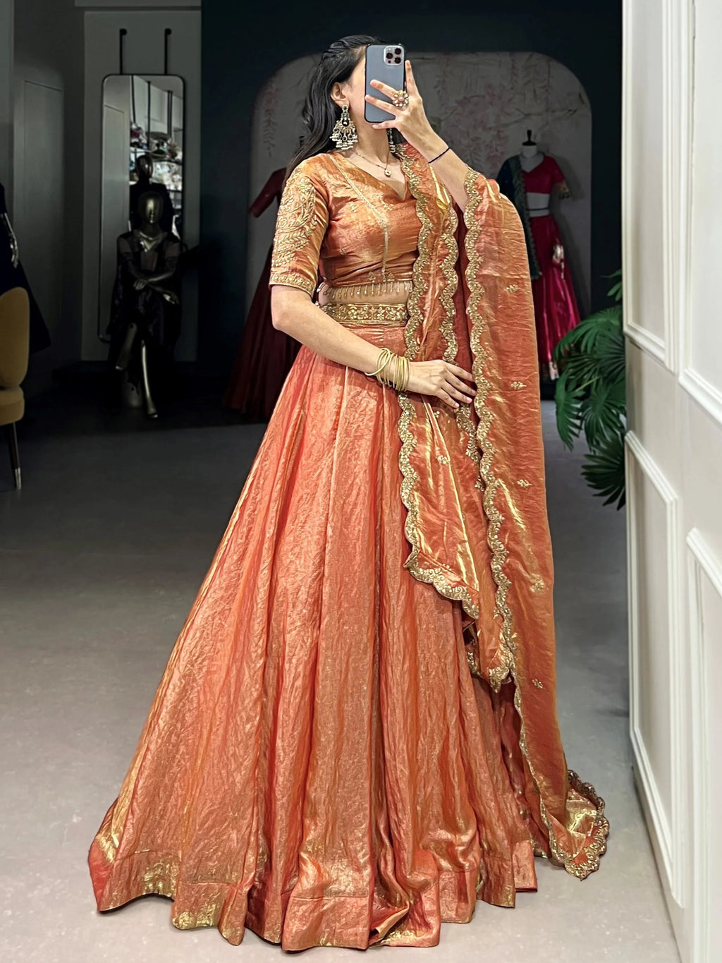 Orange fendi embroidered lehenga choli with sequins thread work dupatta