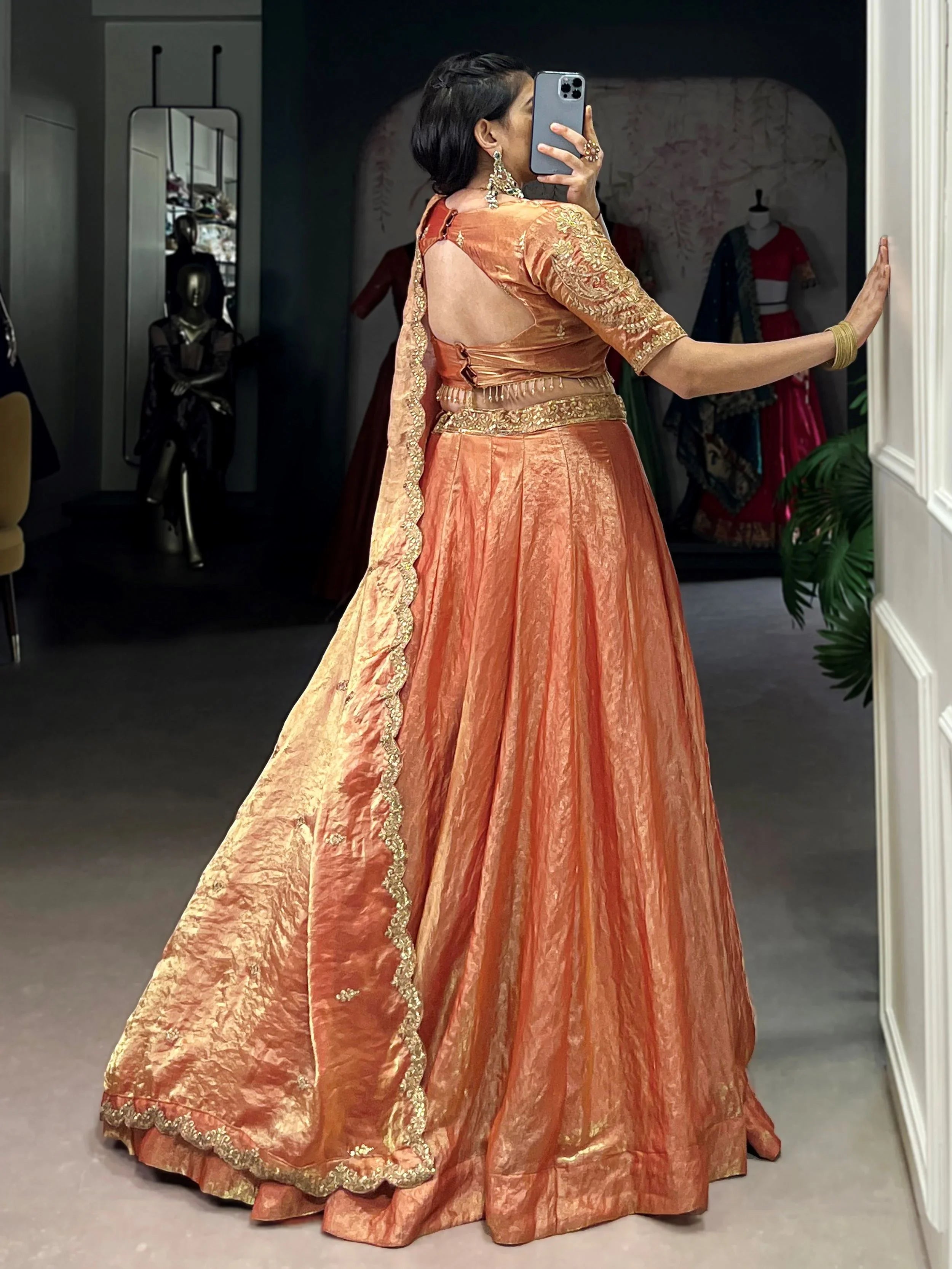 Orange fendi embroidered lehenga choli with sequins thread work dupatta