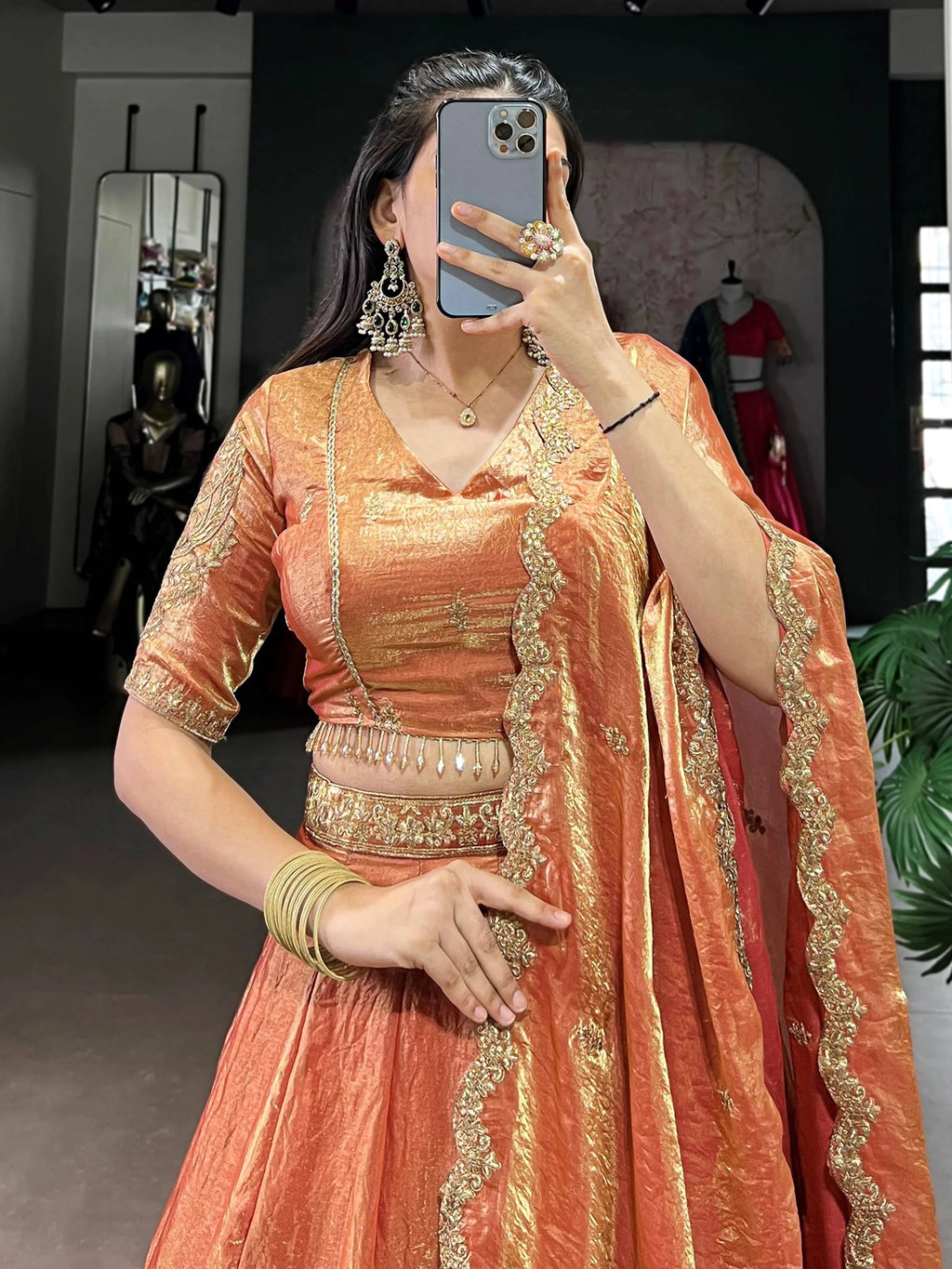Orange fendi embroidered lehenga choli with sequins thread work dupatta