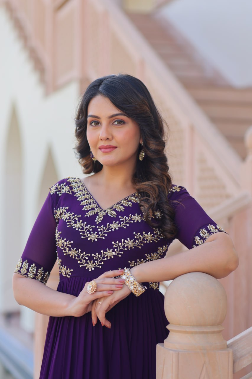 VAIDEHI FULLY FLARED PURPLE FAUX BLOOMING GOWN WITH RICH SEQUINS BEADS EMBROIDERED WORK