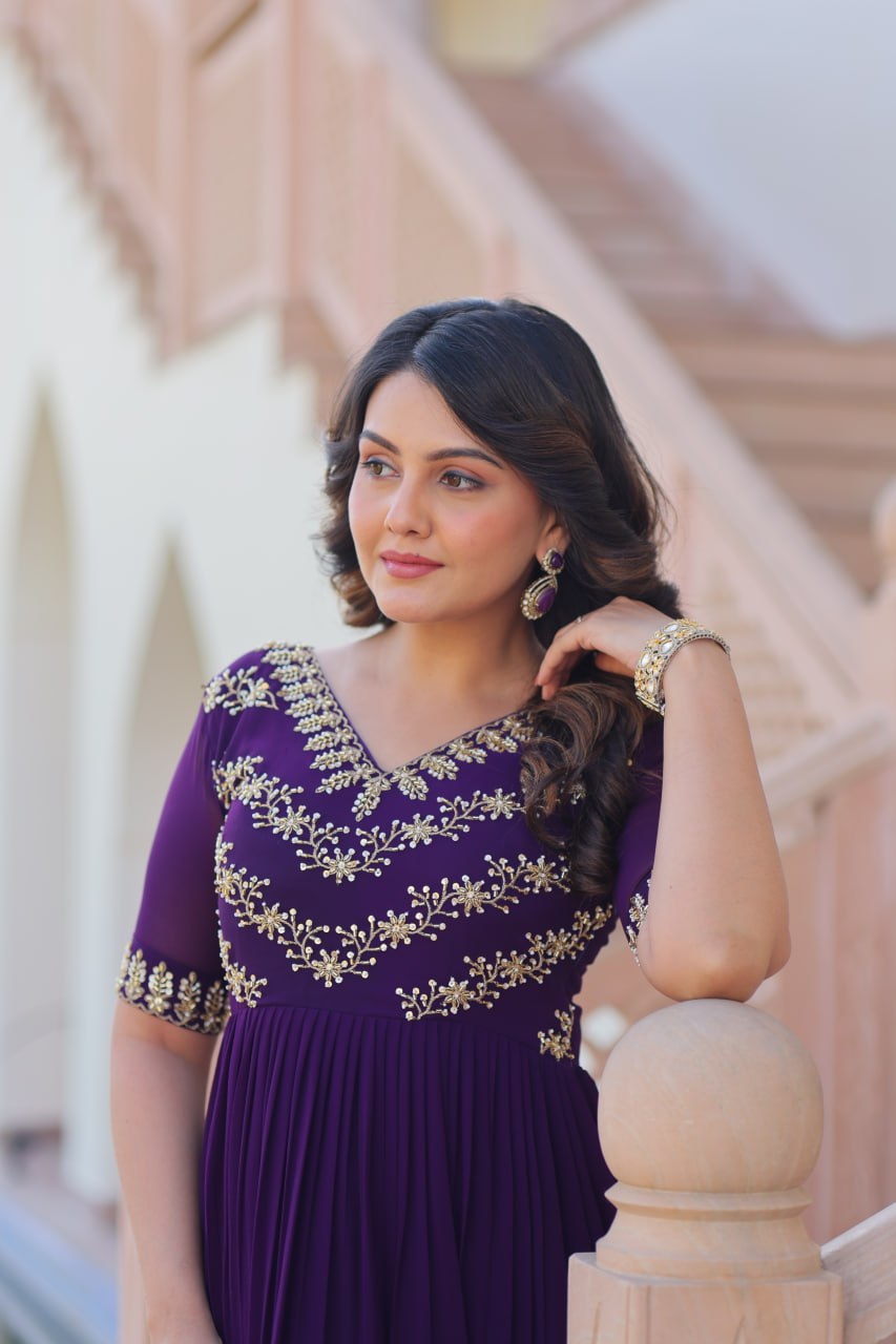 VAIDEHI FULLY FLARED PURPLE FAUX BLOOMING GOWN WITH RICH SEQUINS BEADS EMBROIDERED WORK