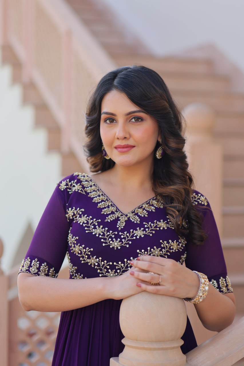 VAIDEHI FULLY FLARED PURPLE FAUX BLOOMING GOWN WITH RICH SEQUINS BEADS EMBROIDERED WORK