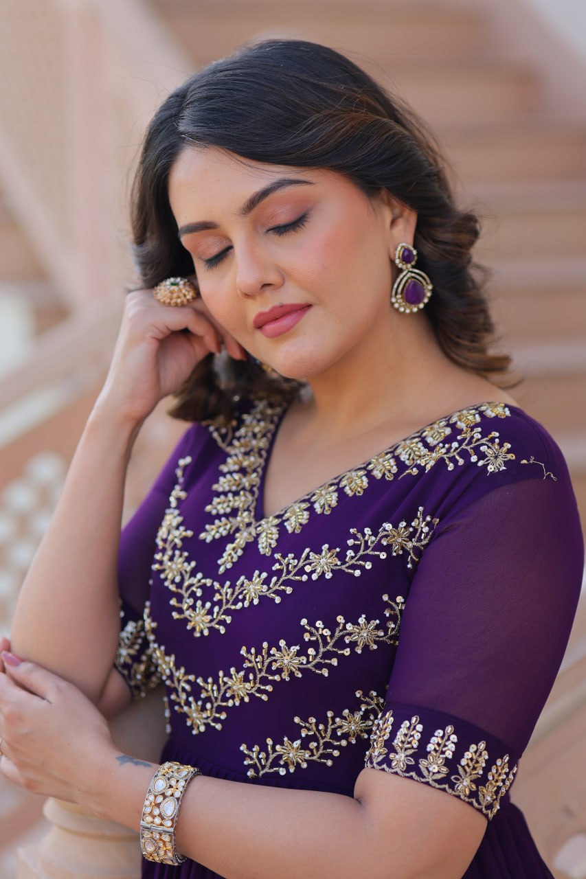 VAIDEHI FULLY FLARED PURPLE FAUX BLOOMING GOWN WITH RICH SEQUINS BEADS EMBROIDERED WORK