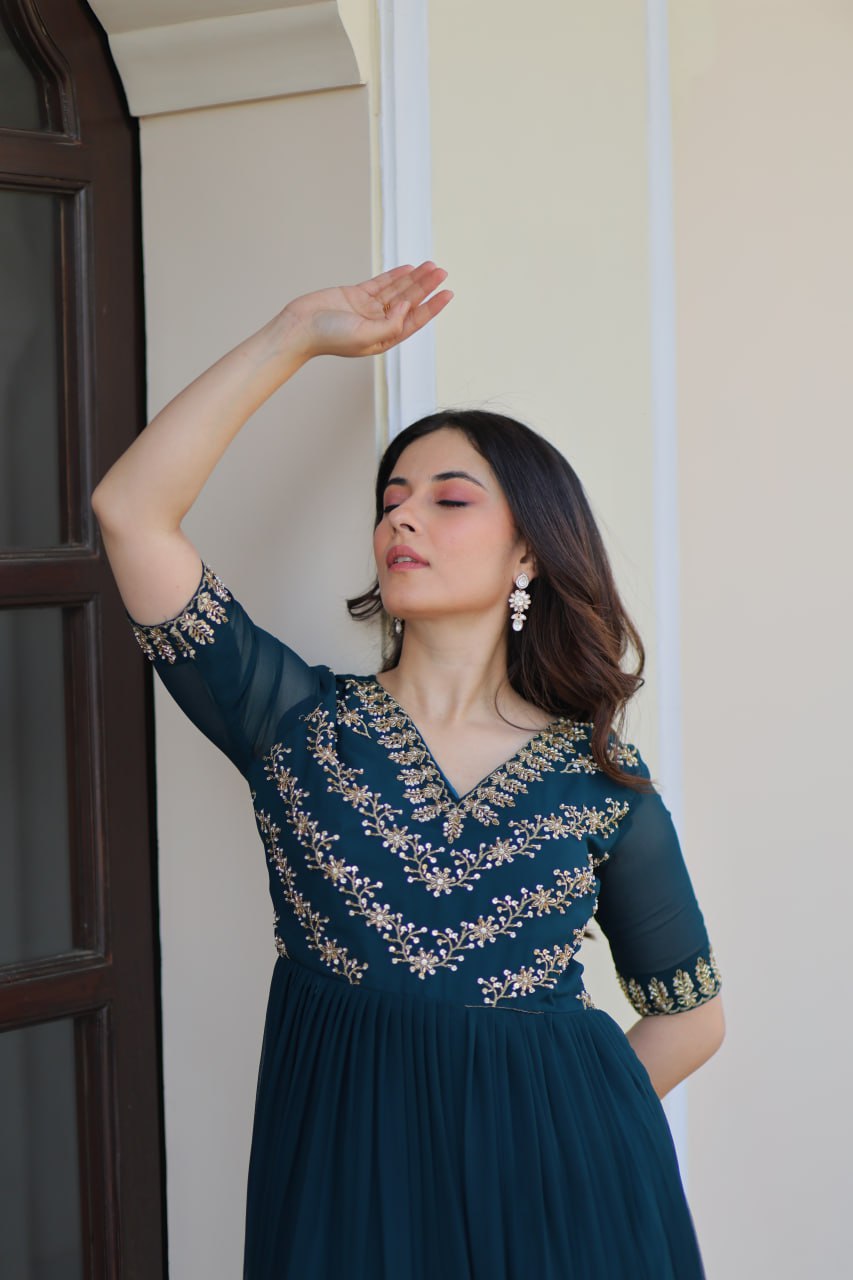 VAIDEHI FULLY FLARED RAMA FAUX BLOOMING GOWN WITH RICH SEQUINS BEADS EMBROIDERED WORK