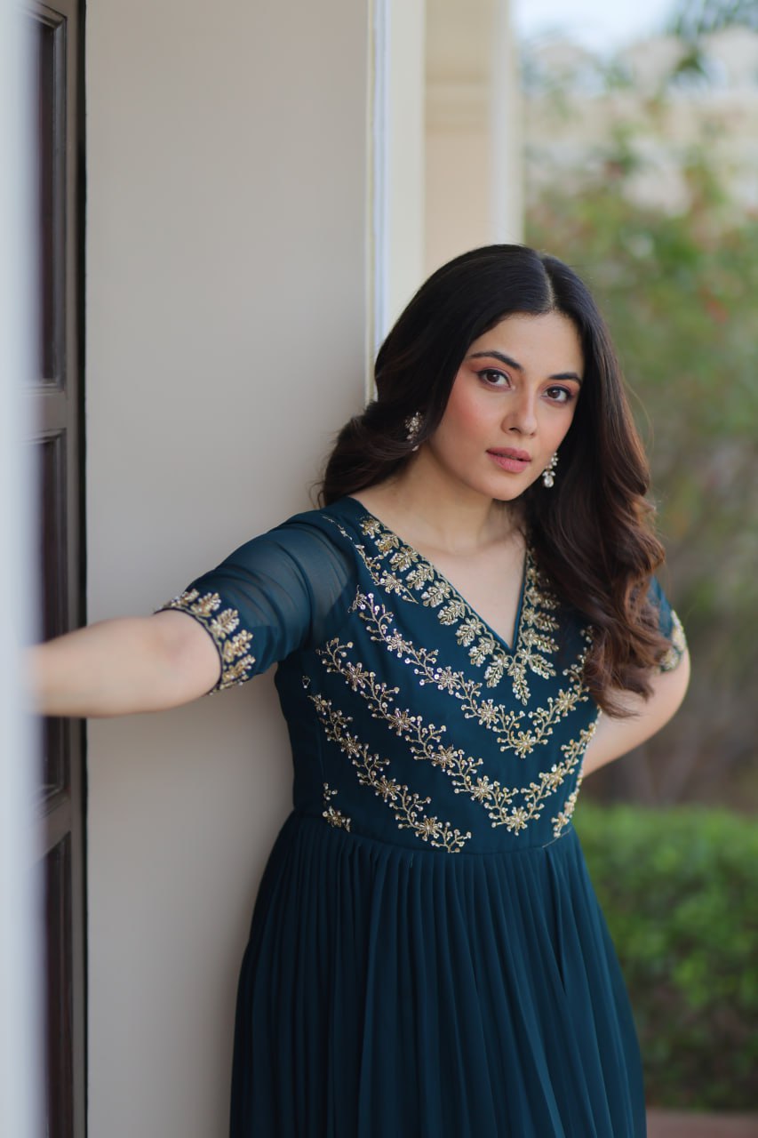 VAIDEHI FULLY FLARED RAMA FAUX BLOOMING GOWN WITH RICH SEQUINS BEADS EMBROIDERED WORK