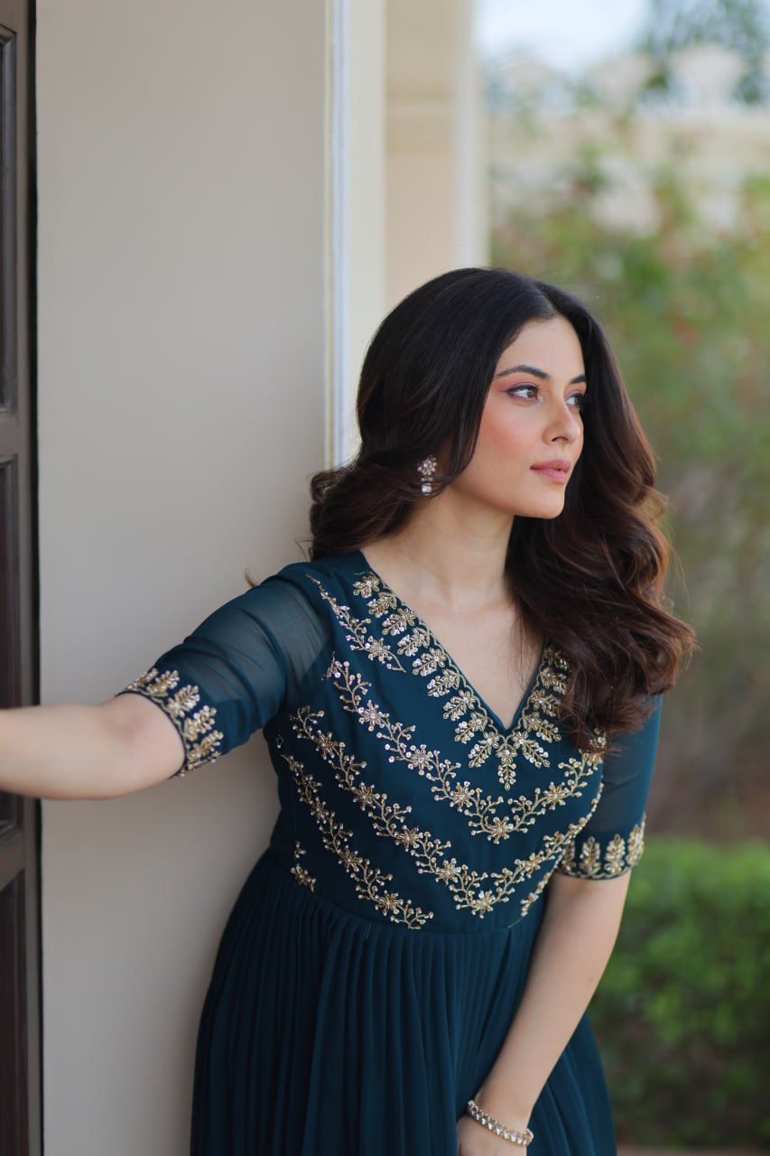 VAIDEHI FULLY FLARED RAMA FAUX BLOOMING GOWN WITH RICH SEQUINS BEADS EMBROIDERED WORK