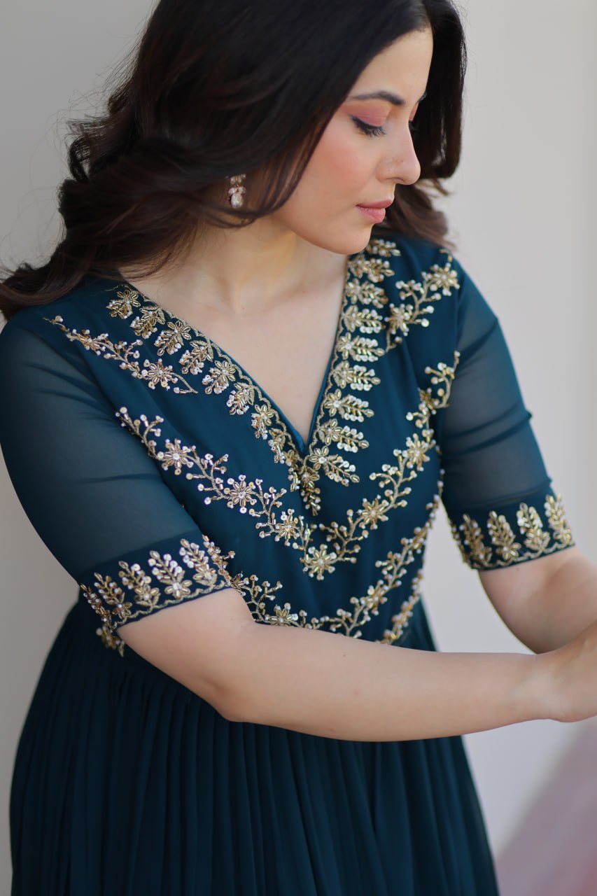 VAIDEHI FULLY FLARED RAMA FAUX BLOOMING GOWN WITH RICH SEQUINS BEADS EMBROIDERED WORK