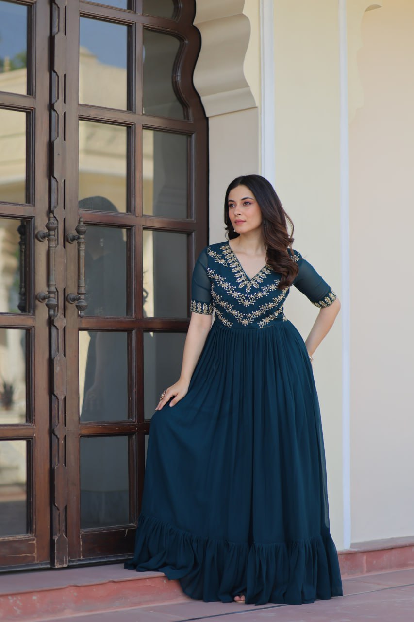 VAIDEHI FULLY FLARED RAMA FAUX BLOOMING GOWN WITH RICH SEQUINS BEADS EMBROIDERED WORK