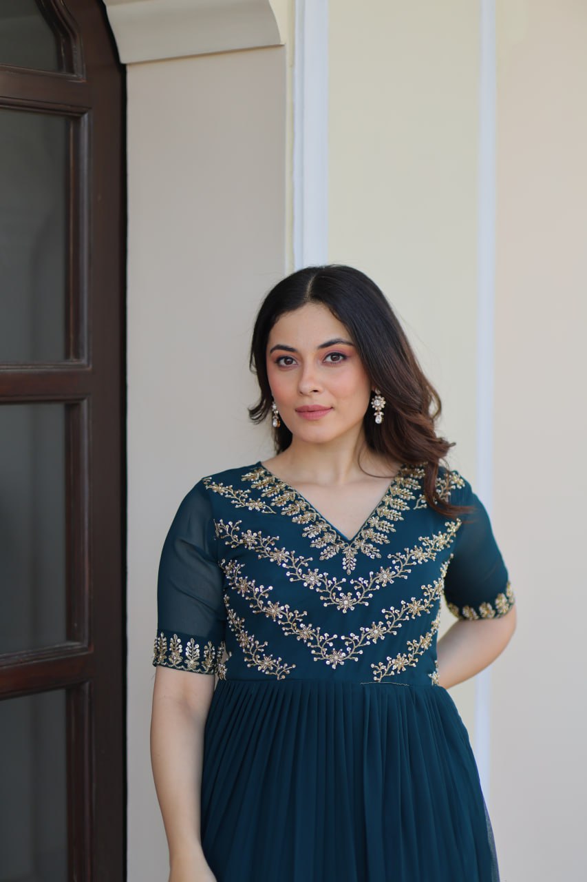 VAIDEHI FULLY FLARED RAMA FAUX BLOOMING GOWN WITH RICH SEQUINS BEADS EMBROIDERED WORK