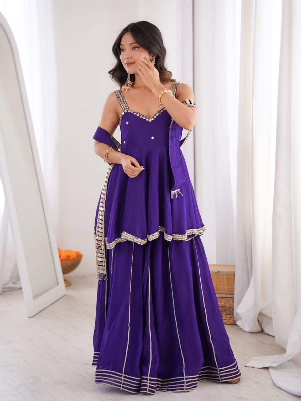 Royal Purple Silk Sharara Set with Mirror-Embellished Strappy Kurti, Pearl Detailing, Layered Flair & Gota Patti Borders
