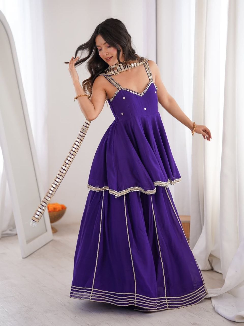 Royal Purple Silk Sharara Set with Mirror-Embellished Strappy Kurti, Pearl Detailing, Layered Flair & Gota Patti Borders