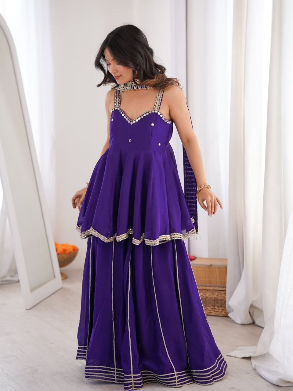 Royal Purple Silk Sharara Set with Mirror-Embellished Strappy Kurti, Pearl Detailing, Layered Flair & Gota Patti Borders