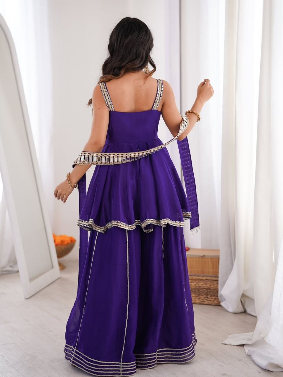 Royal Purple Silk Sharara Set with Mirror-Embellished Strappy Kurti, Pearl Detailing, Layered Flair & Gota Patti Borders