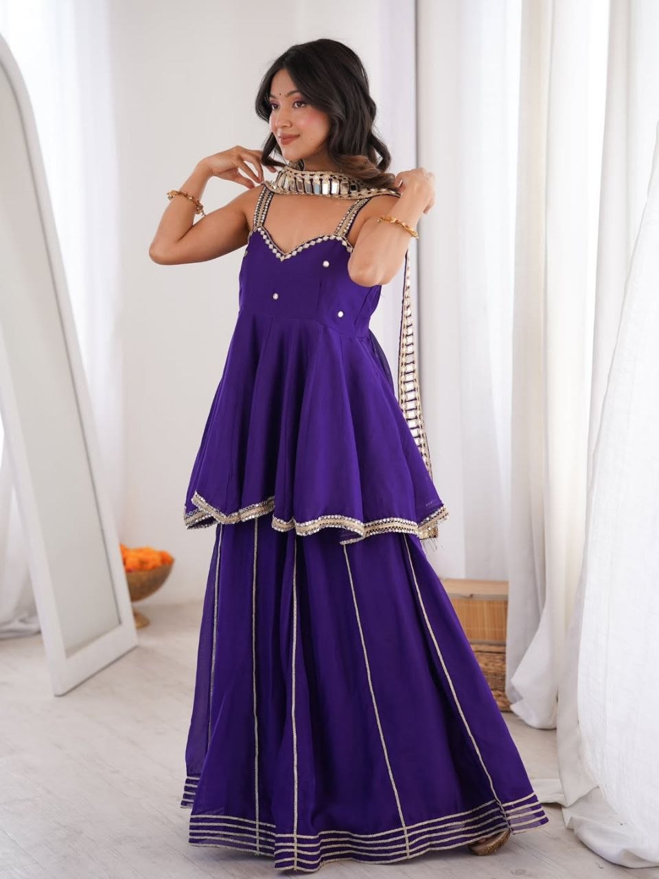 Royal Purple Silk Sharara Set with Mirror-Embellished Strappy Kurti, Pearl Detailing, Layered Flair & Gota Patti Borders