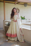 Ivory Cream Floral Embroidered Anarkali Gown with Delicate Red Butti Work, Intricate Floral Hem Border & Matching Dupatta