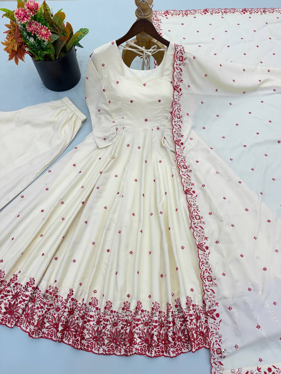 Ivory Cream Floral Embroidered Anarkali Gown with Delicate Red Butti Work, Intricate Floral Hem Border & Matching Dupatta