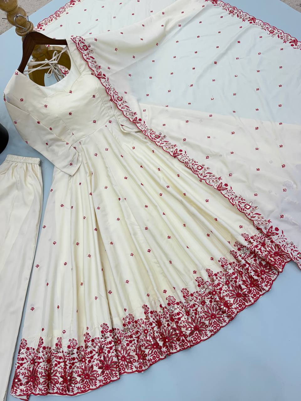 Ivory Cream Floral Embroidered Anarkali Gown with Delicate Red Butti Work, Intricate Floral Hem Border & Matching Dupatta