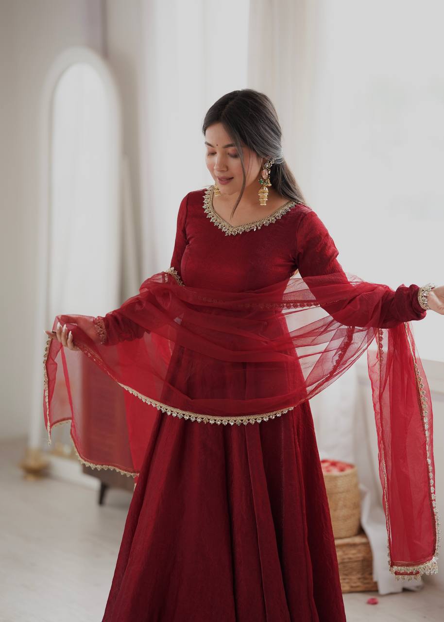 Elegant Wine Red Silk Anarkali Gown with Embellished Neckline & Sheer Dupatta