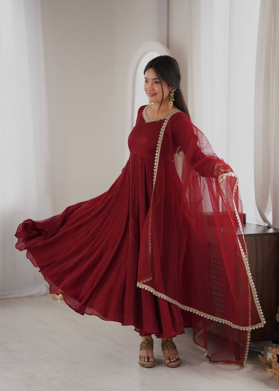 Elegant Wine Red Silk Anarkali Gown with Embellished Neckline & Sheer Dupatta