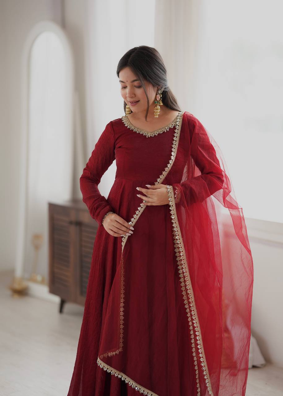 Elegant Wine Red Silk Anarkali Gown with Embellished Neckline & Sheer Dupatta