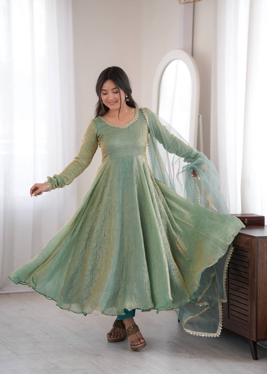 Elegant Mint Green Silk Anarkali Gown with Embellished Neckline & Sheer Dupatta