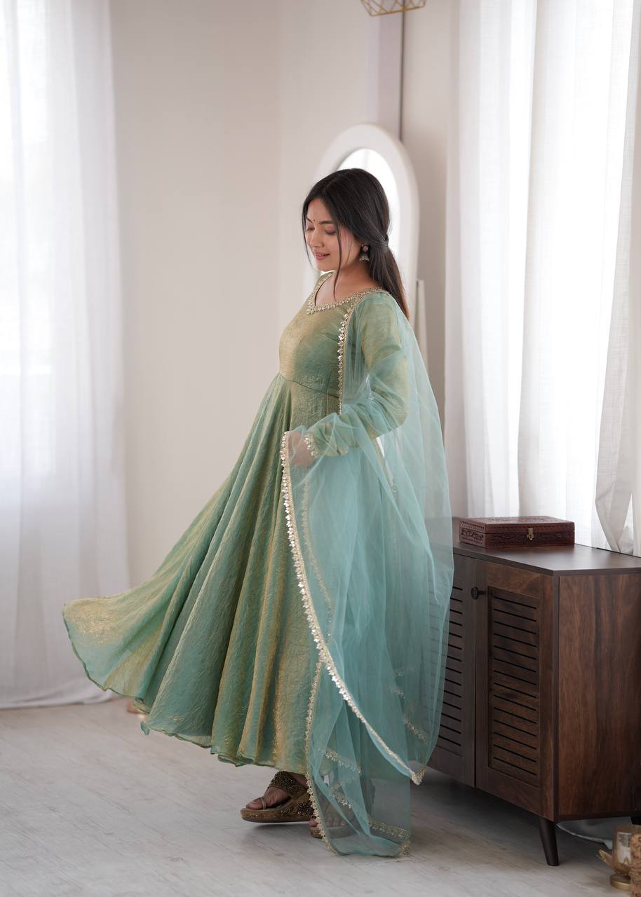 Elegant Mint Green Silk Anarkali Gown with Embellished Neckline & Sheer Dupatta