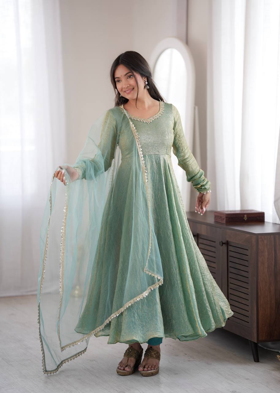 Elegant Mint Green Silk Anarkali Gown with Embellished Neckline & Sheer Dupatta