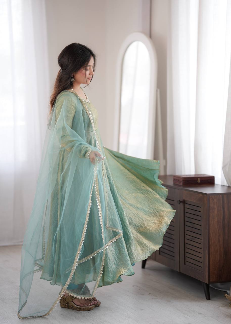 Elegant Mint Green Silk Anarkali Gown with Embellished Neckline & Sheer Dupatta