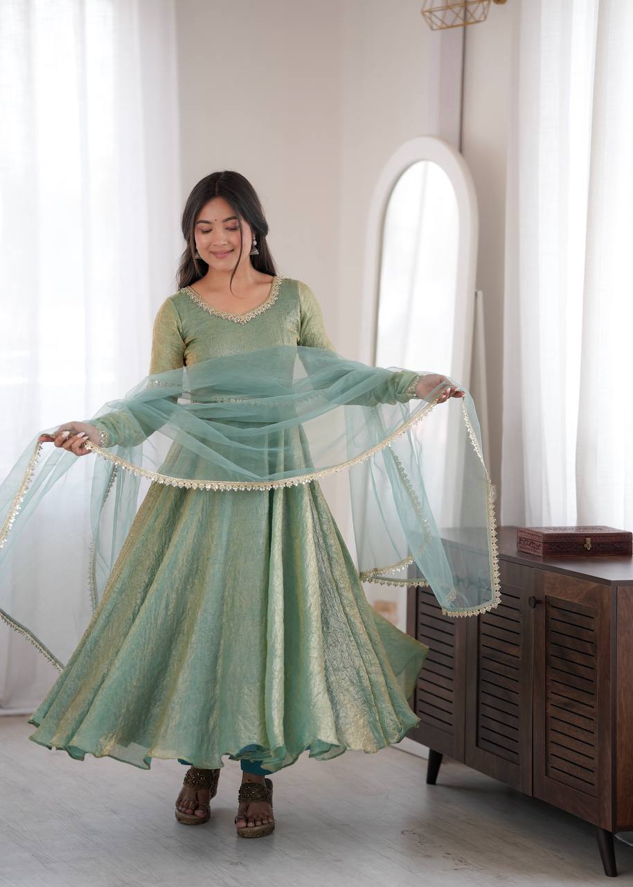 Elegant Mint Green Silk Anarkali Gown with Embellished Neckline & Sheer Dupatta