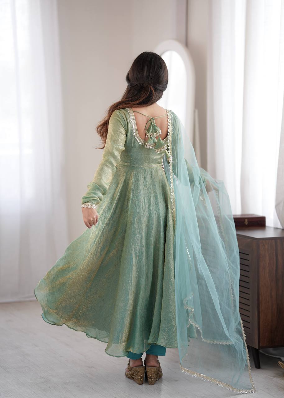 Elegant Mint Green Silk Anarkali Gown with Embellished Neckline & Sheer Dupatta
