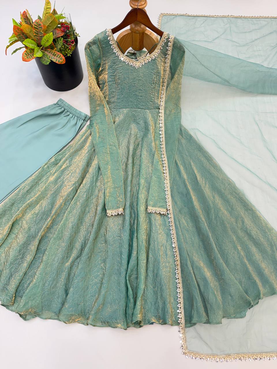 Elegant Mint Green Silk Anarkali Gown with Embellished Neckline & Sheer Dupatta